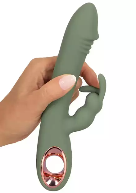 Vibraattori naisen kädessä ja sormi taivuttaa klitoriskiihottimen korvaa - Vibraattorit - 4024144481941 - 2