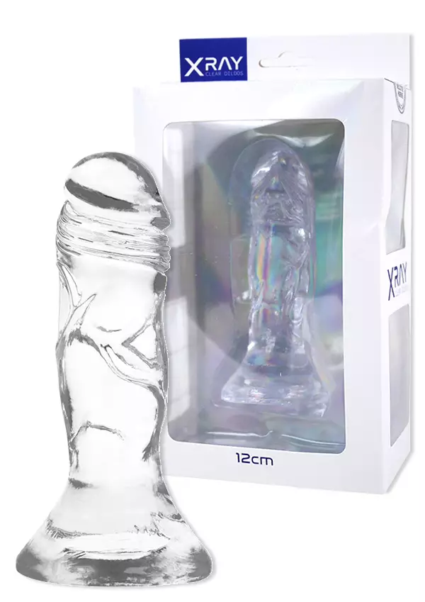 Peniksen mallinan, kannasta leve=C3=A4 dildo. Takana valkoinen myyntip=
akkaus - Dildot ja Tekopenikset - 8435565910136 - 1