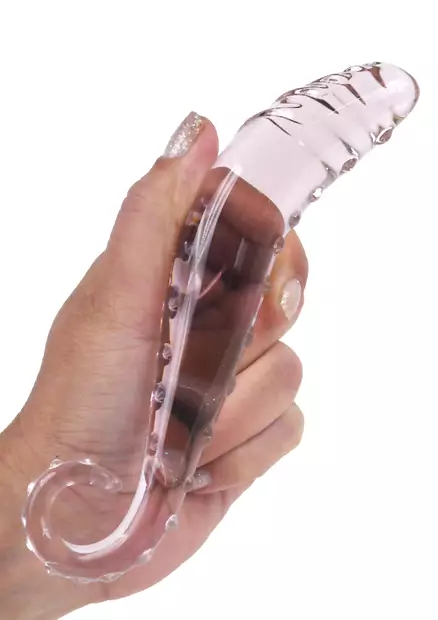 Lasidildo naisen kädessä - Dildot ja Tekopenikset - 8713221845368 - 2